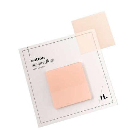 Square sticky notes in pink shades presented on a ivory background.