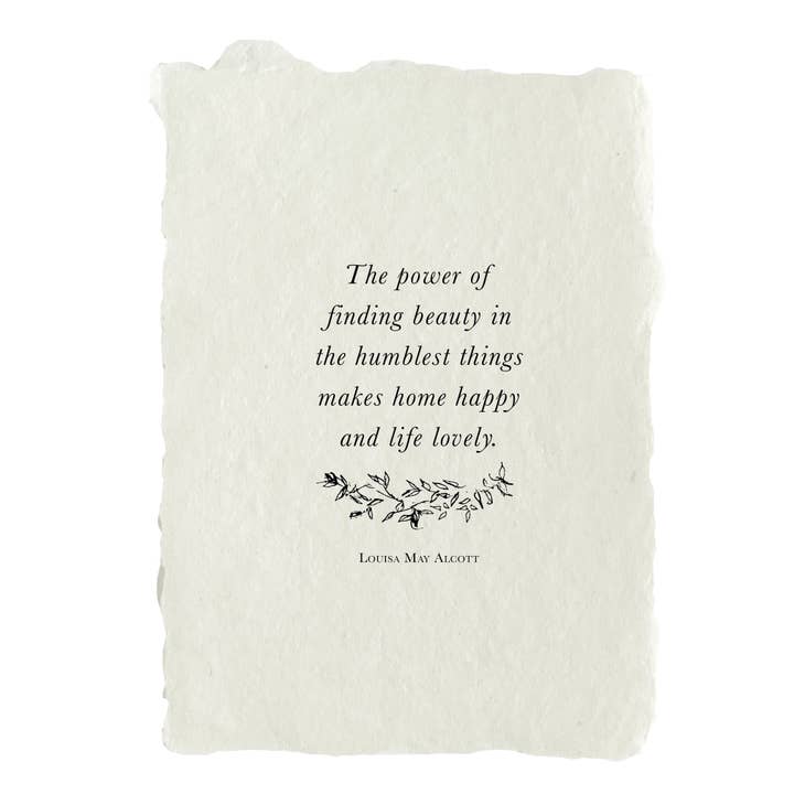 Art print on white paper with black text saying, “The power of finding beauty in the humblest things makes home happy and life lovely. Louisa May Alcott”.