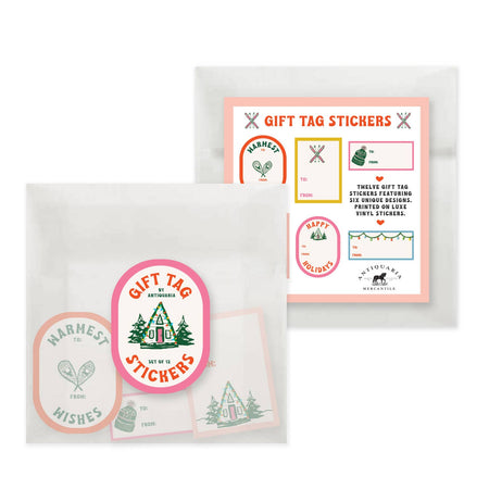 Gift tag stickers with various images of cabins and mountains scenes and cactus plants with text saying various holiday greetings.