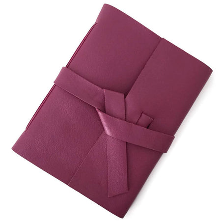 Mulberry Purple soft leather cover with two leather straps crossed in the middle.