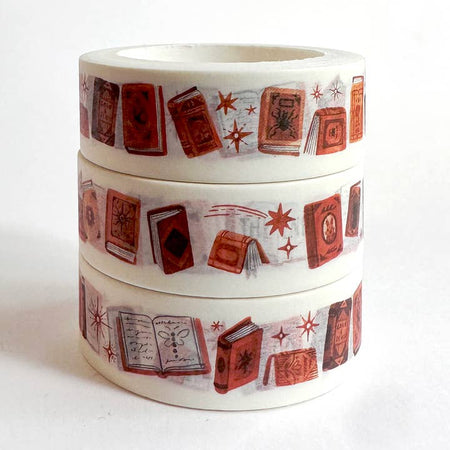 White background washi tape with images of red books. 