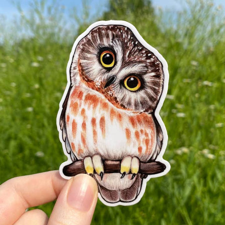 Sticker in the image of a brown owl sitting on a brown tree branch.