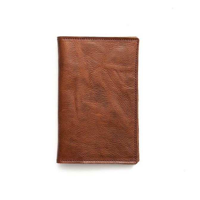 Brown leather cover opening on the right side.