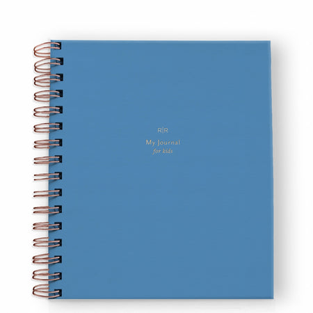 Notebook with blue cover with gold foil text saying, “My Journal for Kids”. Gold coil binding on left side.