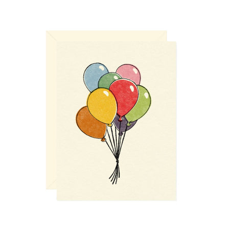 Ivory card with image of a bunch of colorful balloons. A cream envelope is included.