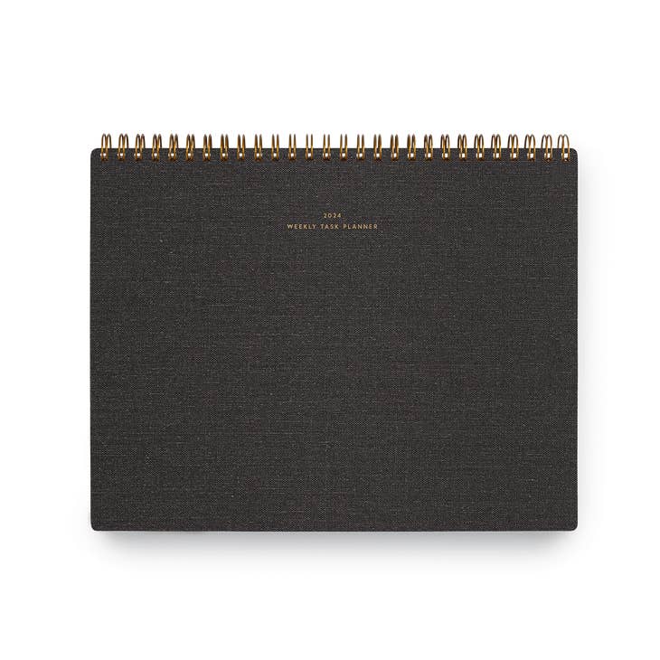 Charcoal gray cover with gold foil text saying, 