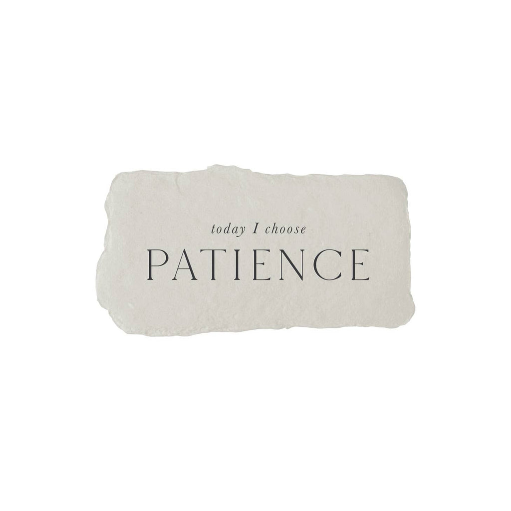 Gray rectangle with torn edges and black text saying, “Today I Choose Patience”.