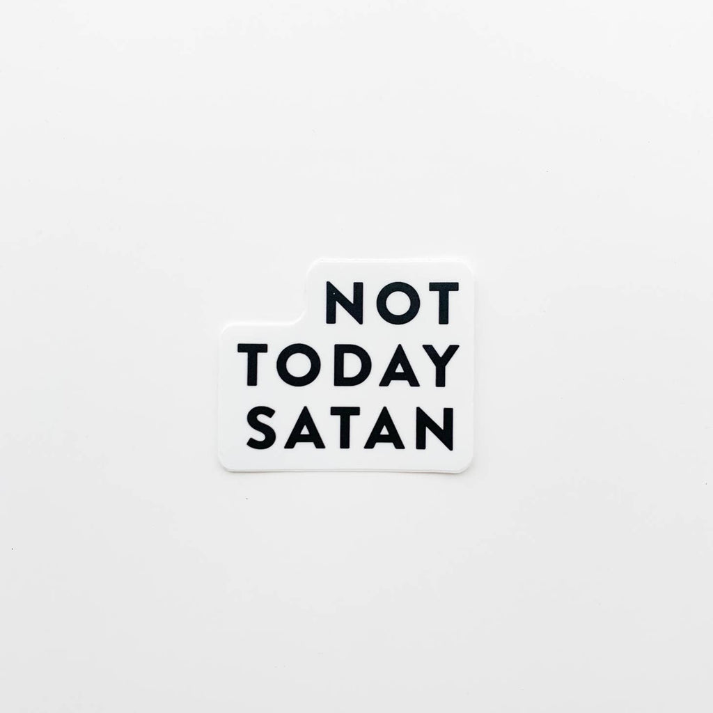 White sticker with black text saying, “Not Today Satan”.