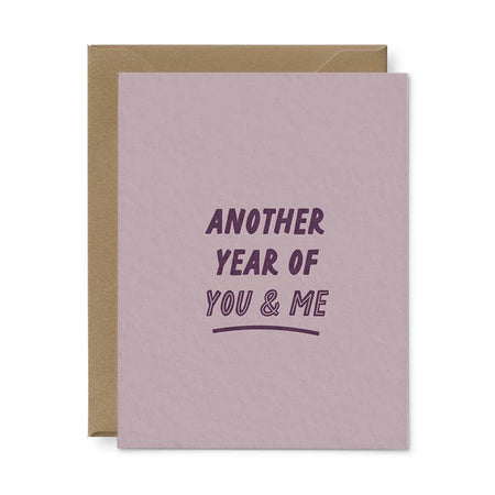 Purple card with dark purple text saying, 