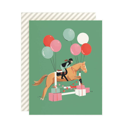 Green card with image of a jockey riding a brown horse over a hurdle. Hurdle is decorated with balloons and birthday gifts on each side. An ivory envelope is included.
