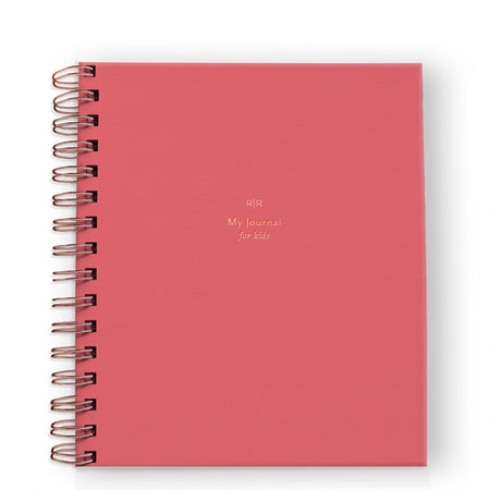 Notebook with red cover with gold foil text saying, “My Journal for Kids”. Gold coil binding on left side.