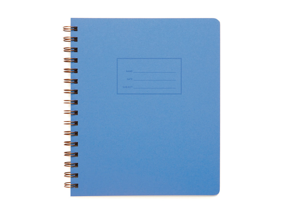 Ocean blue background with rectangular box in center with a place to write name, date and subject. Metal coil binding on left side.   Inside has line pages.
