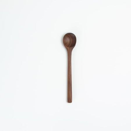 Large wooden spoon utensil.
