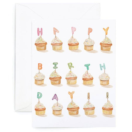 White card with birthday cupcakes tiled across card. Each cupcake has a letter candle in it spelling out “Happy Birthday!!” A white envelope is included.