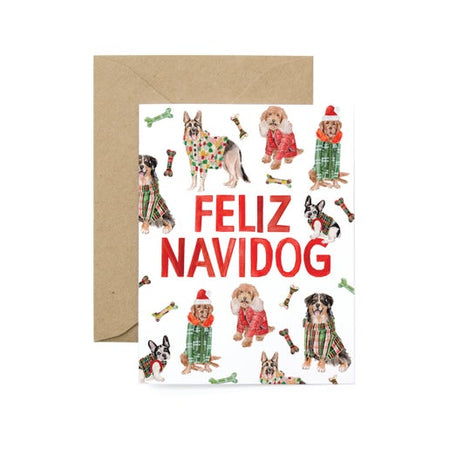 White card with images of several dogs wearing holiday sweaters. Red text saying, “Feliz Navidog”.  A brown kraft envelope is included.