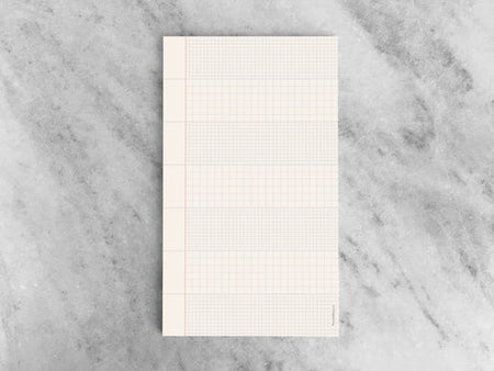 Notebook with rows of large grid patterns and rows with small grid patterns. 