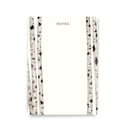 White notepad with gray text saying, “NOTES” across top center. Images of two birch trees along each side of notepad.