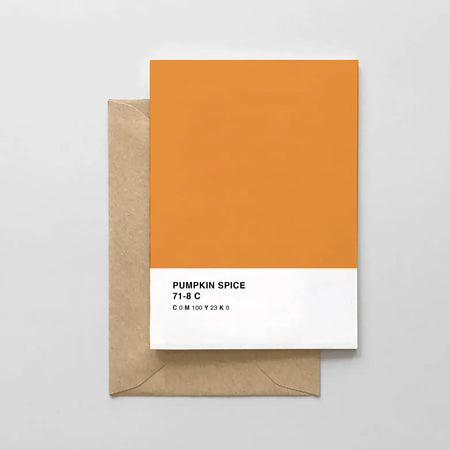 Orange card made to look like a paint chip sample. White band around bottom with black text saying, 
