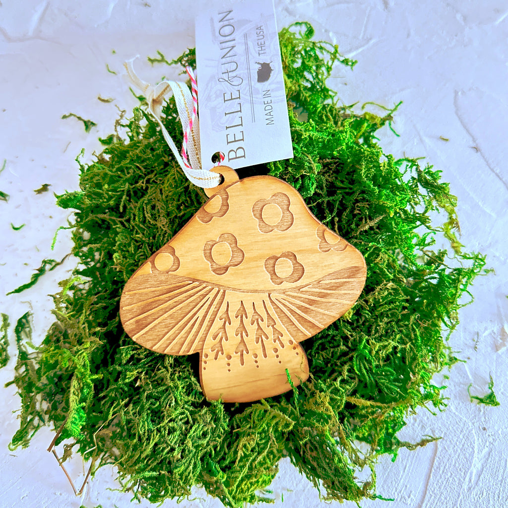 Wooden carved ornament of a mushroom.