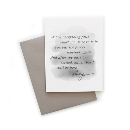 White card with gray text saying, “When everything falls apart, I’m here to help you put the pieces together again. And after the dust has settled, know that I will be here always.” A gray envelope is included.