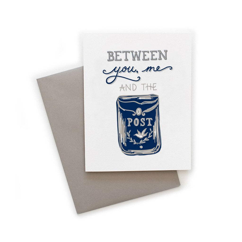 White card with gray and blue text saying, “Between You, Me and the Post”. Image of a blue post office mailbox. A gray envelope is included.