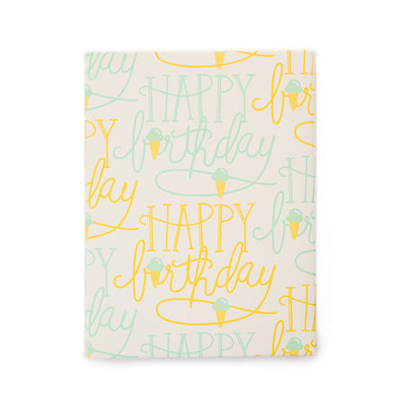 Ivory paper with yellow and teal text saying, “Happy Birthday”. Images of yellow ice cream cone with teal ice cream.