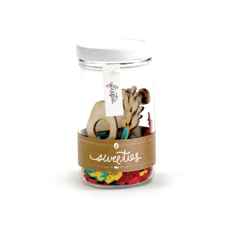 Wooden cupcake picks in cutout shapes of cactus, cowboy hat, taco, margarita and avocado. Packaged in a clear round jar with white lid and gold label.