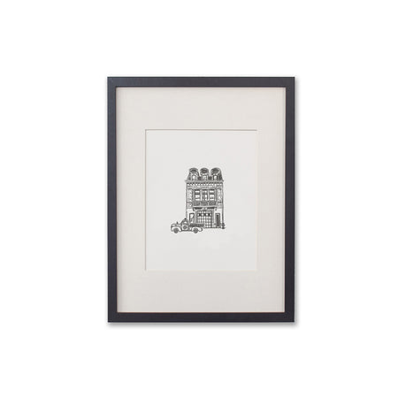 Art print with ivory background and black ink. Images of a tall, fire station building with a vintage fire truck in front. 