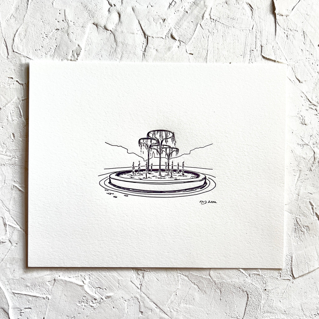 Art print with ivory background and black ink with image of fountain from TCU.