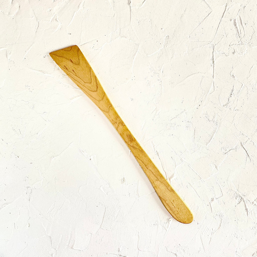 Hand carved wooden thin spatula. 