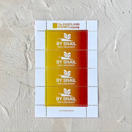 Sheet of ombre colored stamps in yellows and reds with white text saying, 
