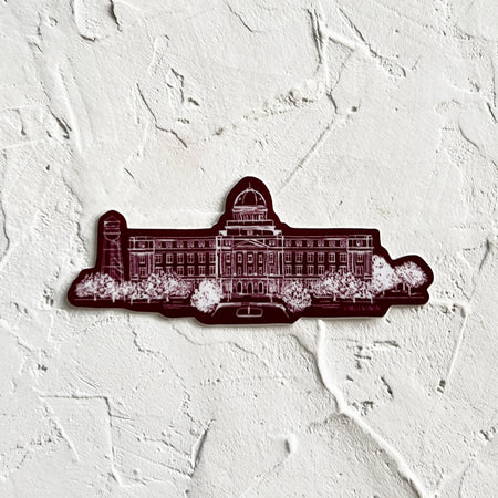 Burgundy color sticker with image of building from Texas A&M University.