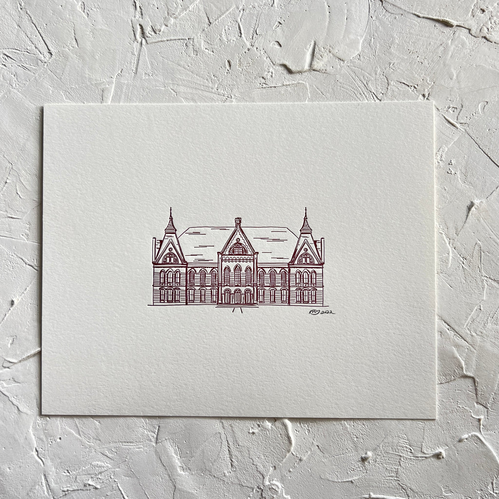 Art print with ivory background with burgundy ink with image of a large mansion from Texas State University.