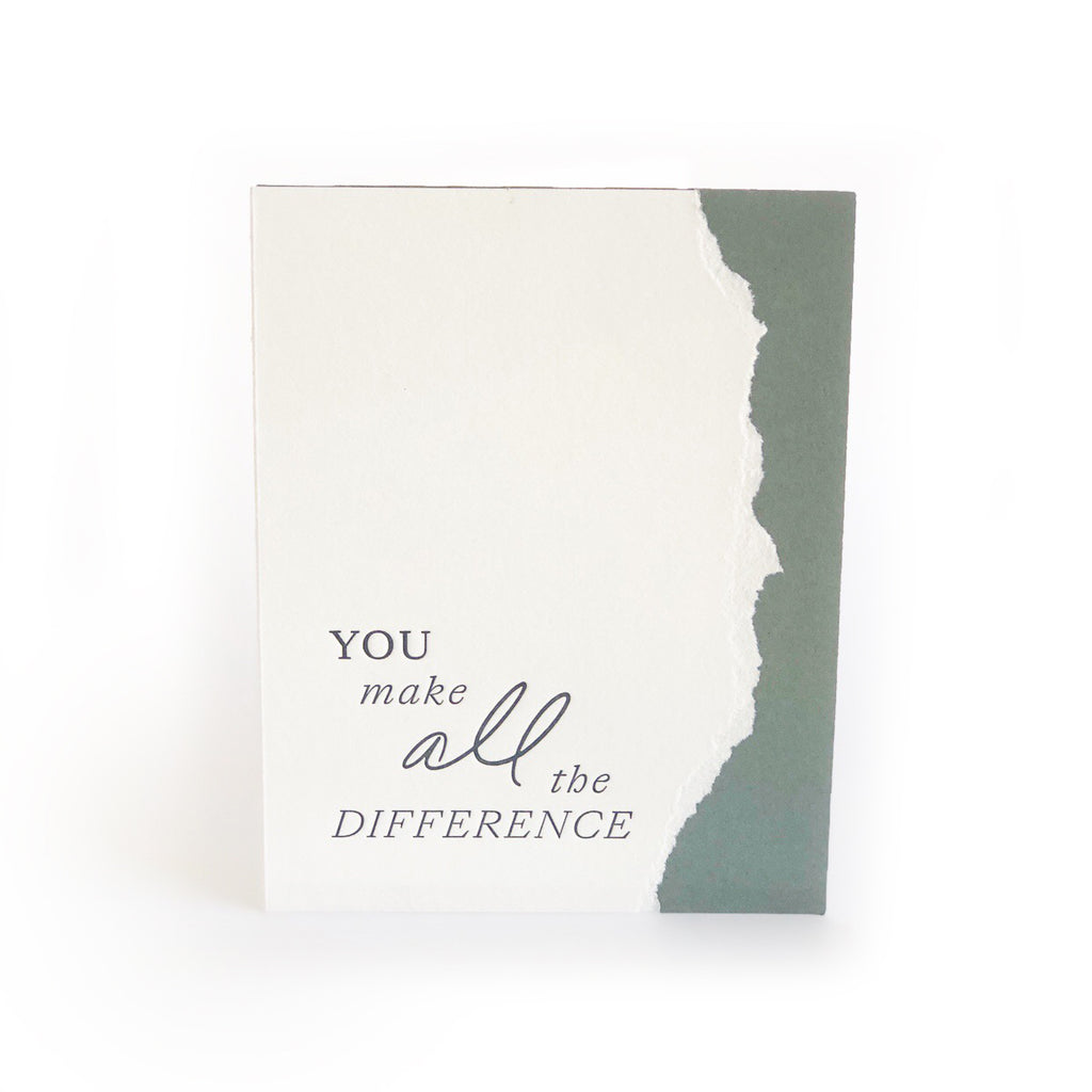 White and green card with curved torn edging where the colors meet with green text saying, “You Make All the Difference”. A white envelope is included.
