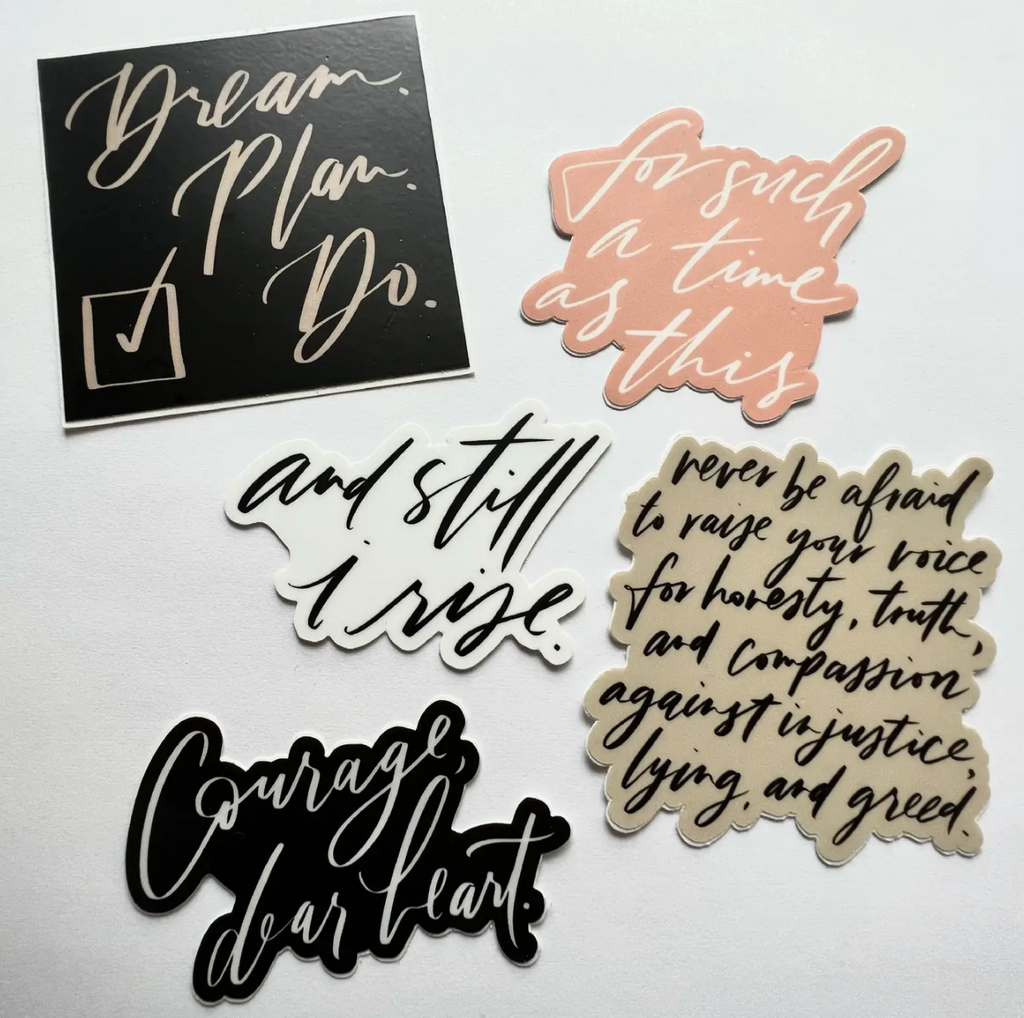 Stickers with text from Bible verses with white text and various colored backgrounds including tan, black, pink and white.