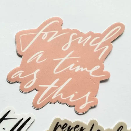 Pink sticker with white script text saying, “For Such A Time  As This”.