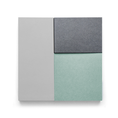 Memo pad divided with gray rectangular pads and green square pads.